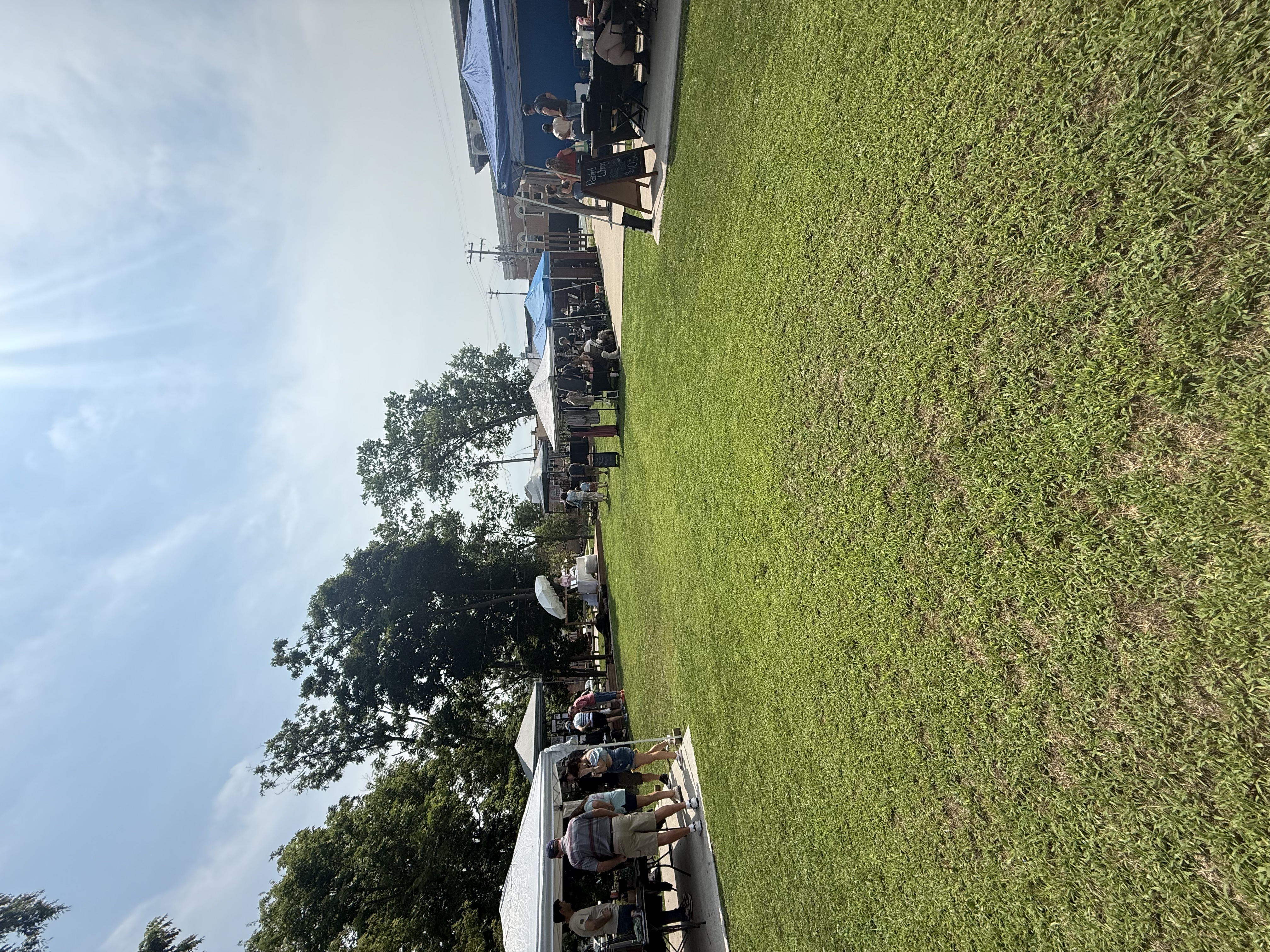 Shoppers browsing vendor booths